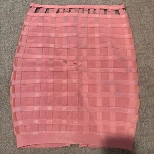 Rose color lattice skirt by BEBE